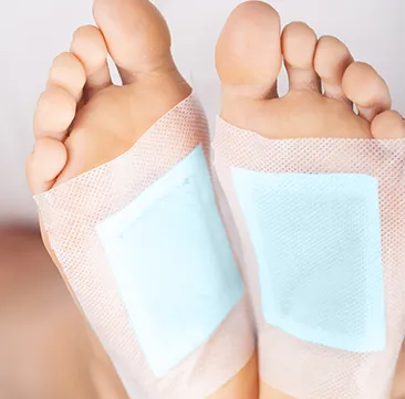 overnight foot pads applied on pad of foot mobile view